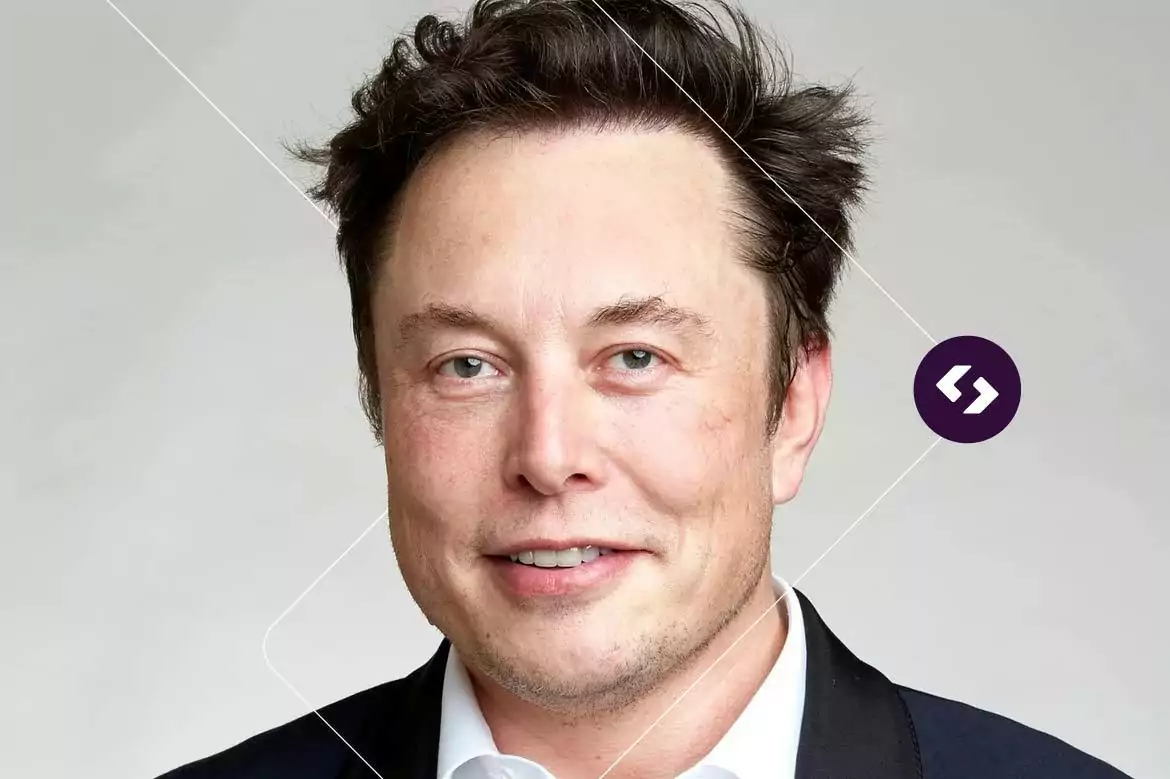 Foto de Elon Musk, homem branco, bilionário, vestindo um terno preto